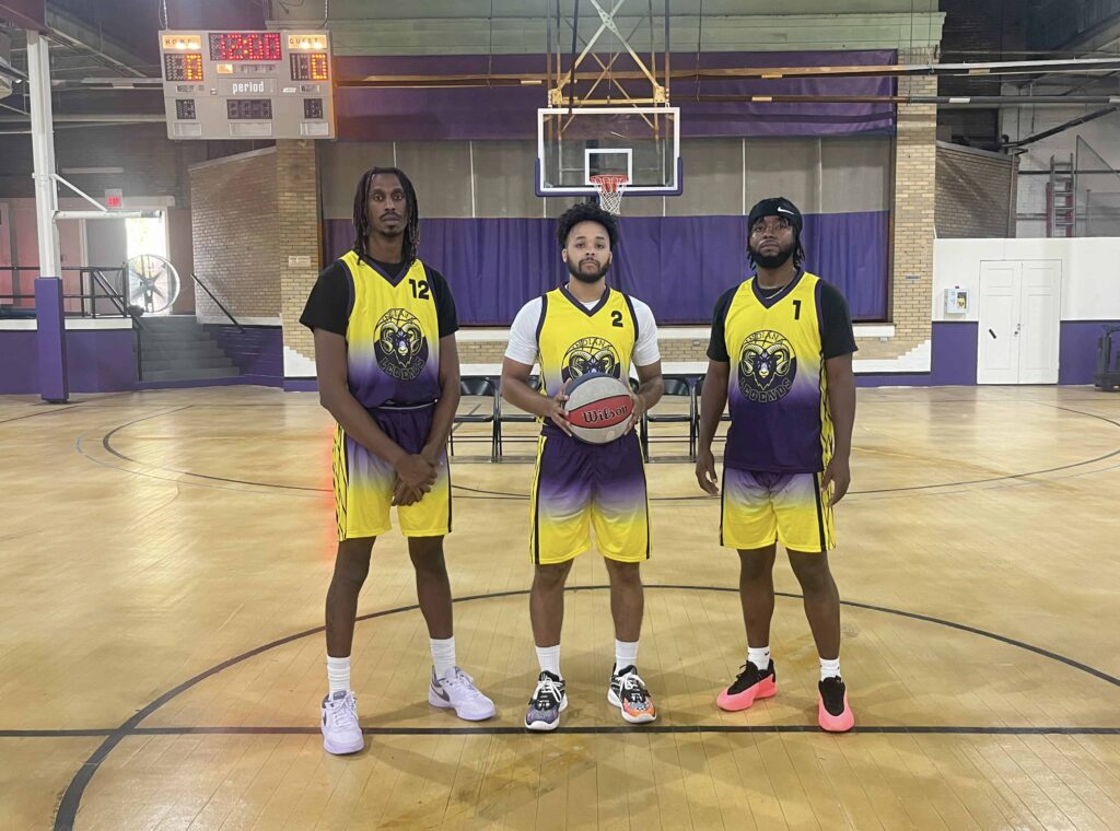 The team captains of the Indiana Legends basketball team posing for photos